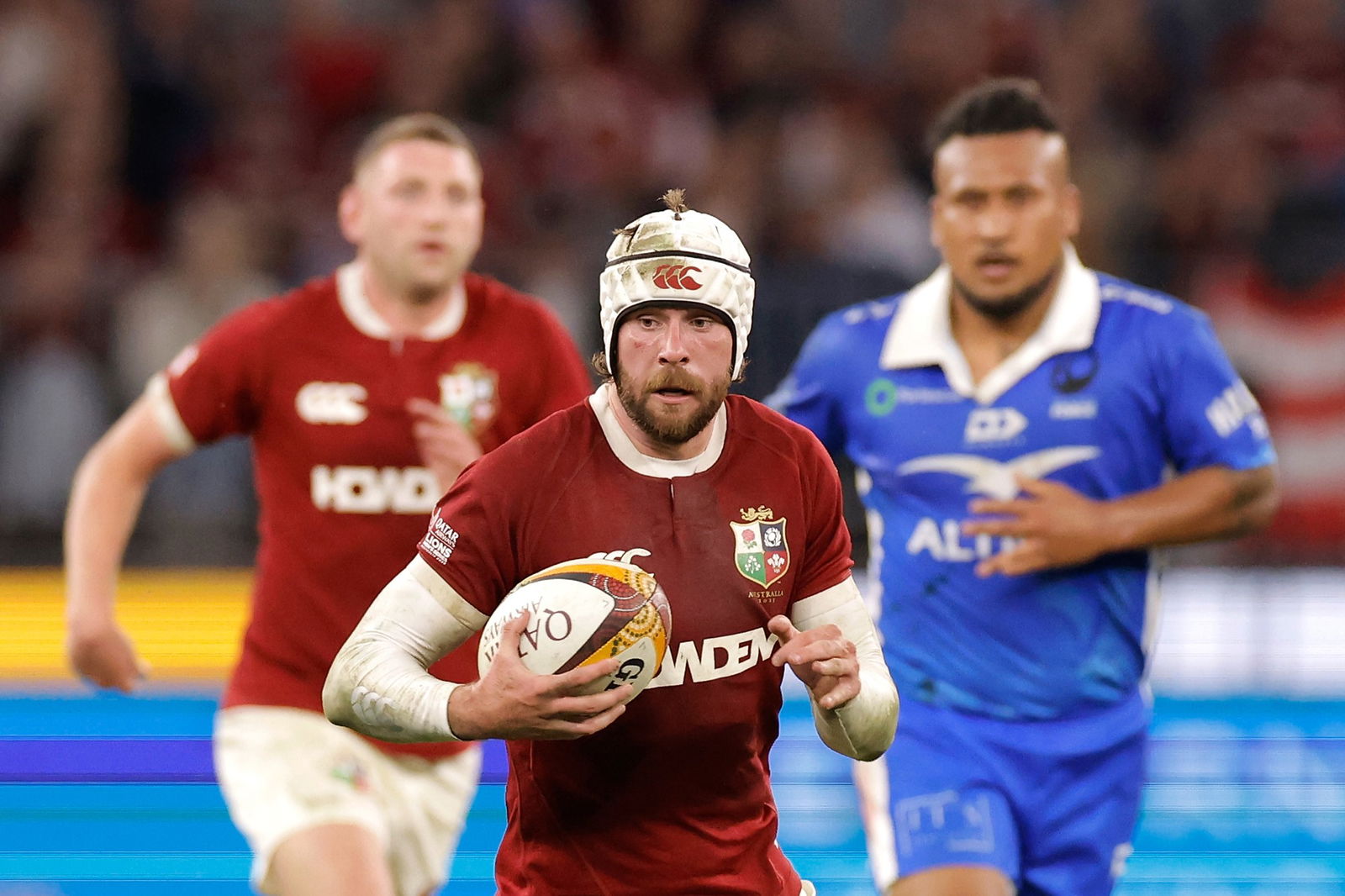 Mack Hansen of the Lions runs the ball during the Super Rugby Tour Match between the Western Force and the British and Irish Lions.
