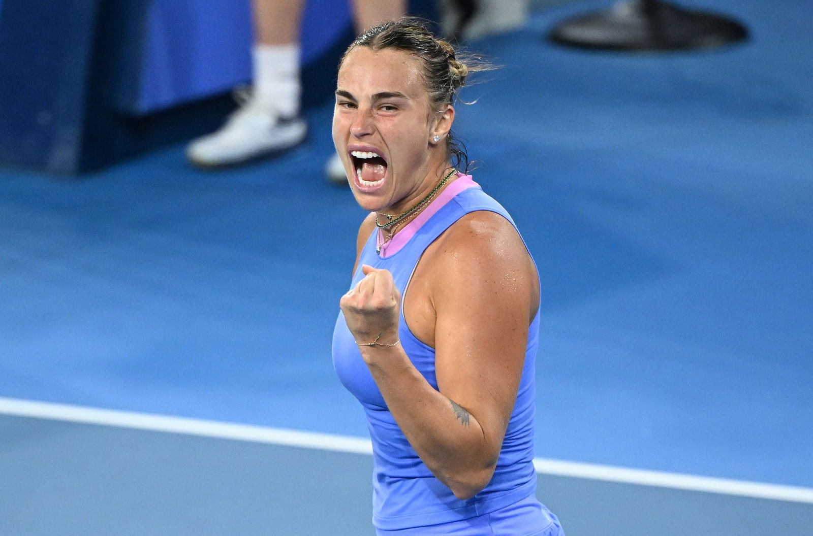 Aryna Sabalenka pumps her fist.