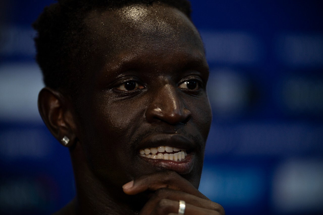 Peter Bol watches the second 800m semifinal intently 