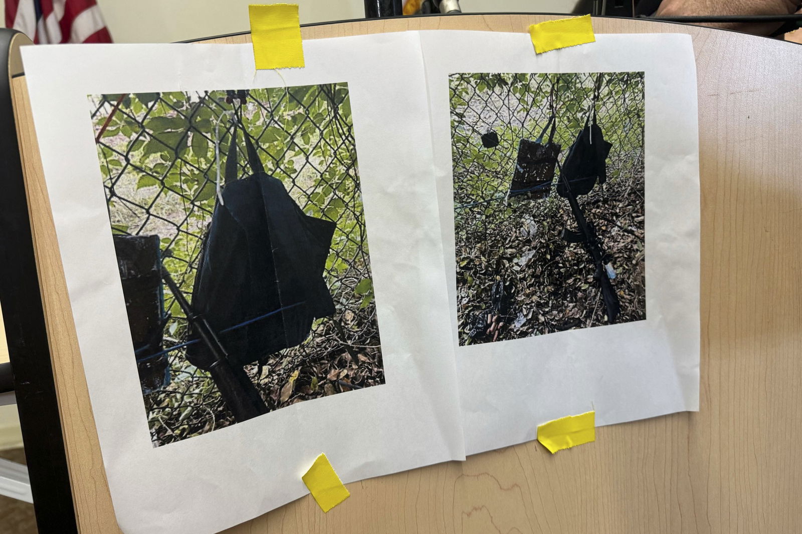 Photos taped to a board of the alleged weapon