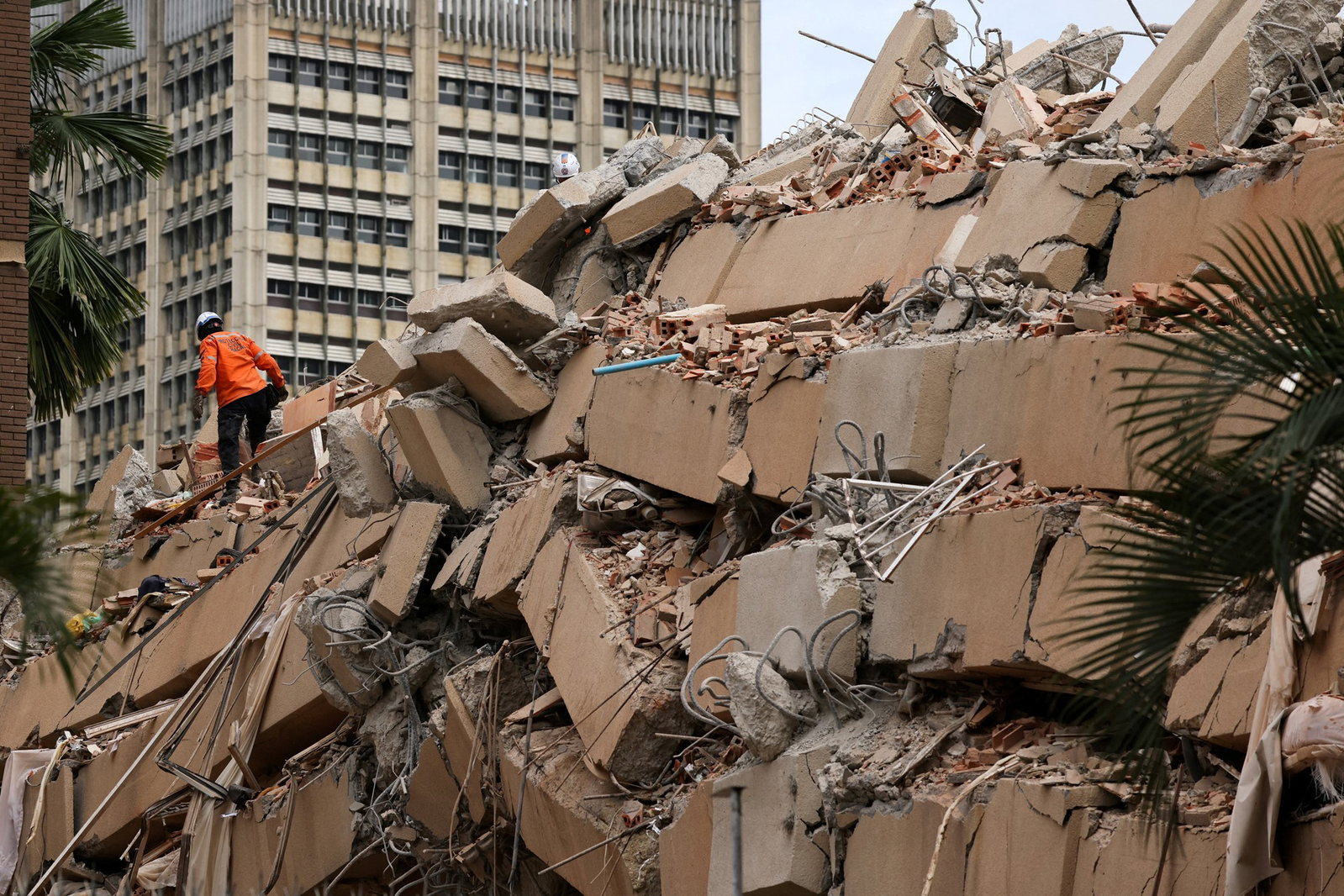 Resucers search through the rubble in Caracas