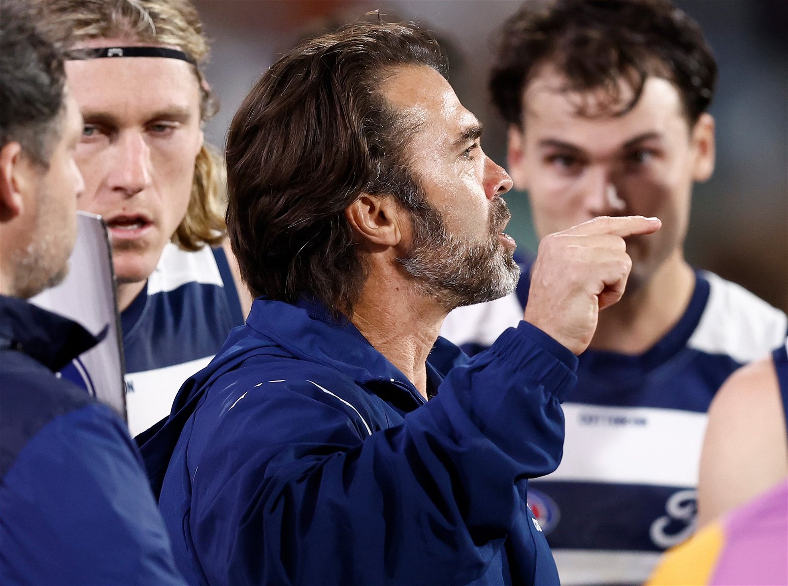 Geelong coach Chris Scott speaks to his team during the game against Western Bulldogs.