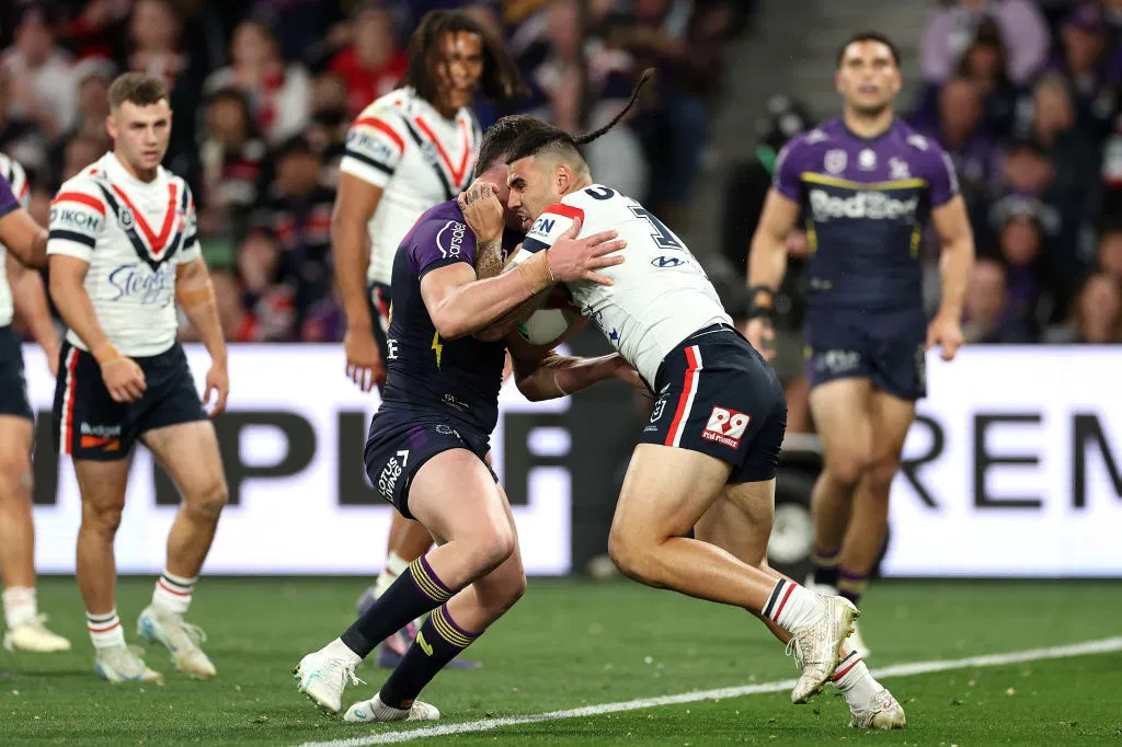 Trent Loiero tackles Terrell May.