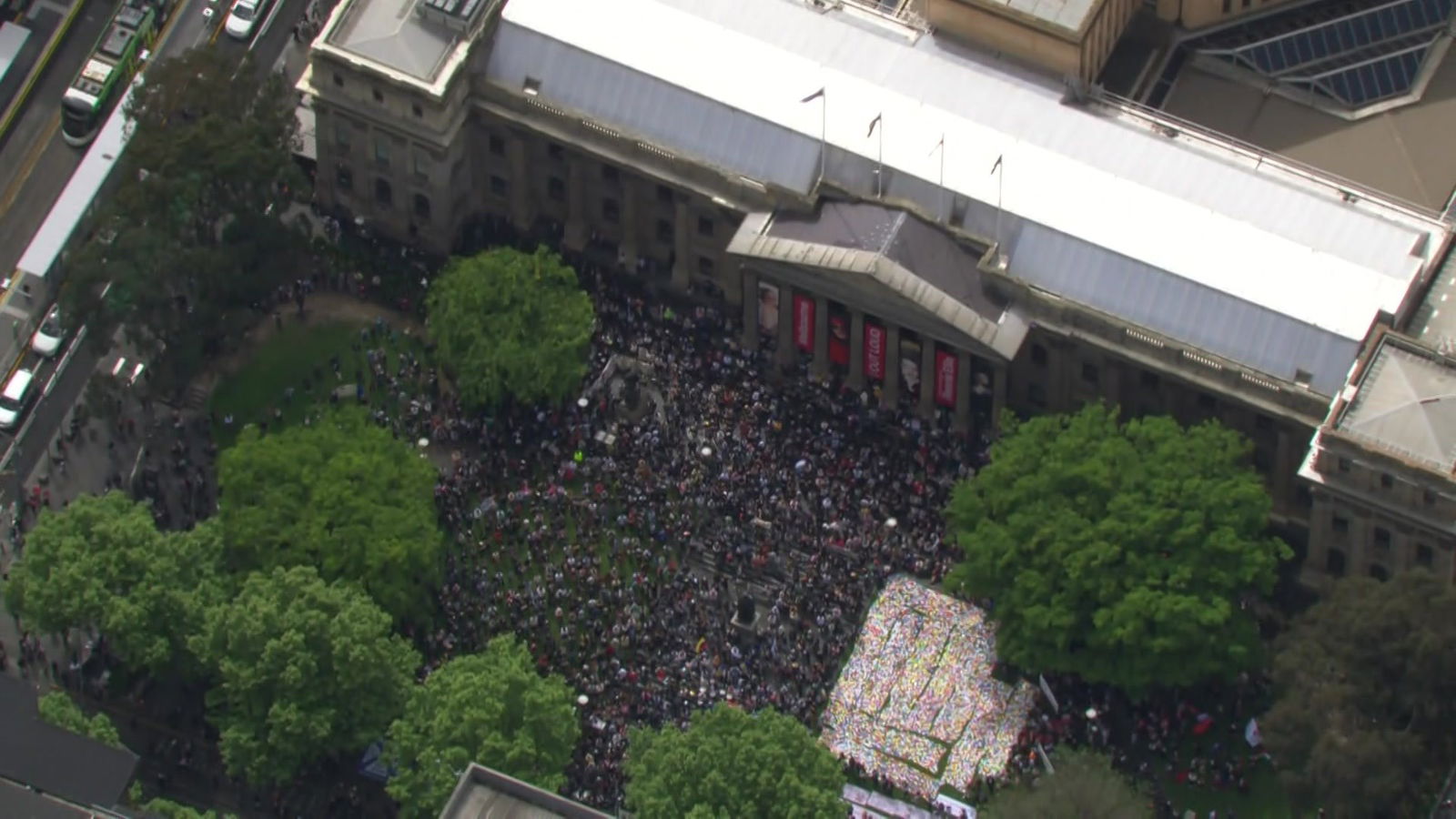 A crowd in front of the State Library of Victoria