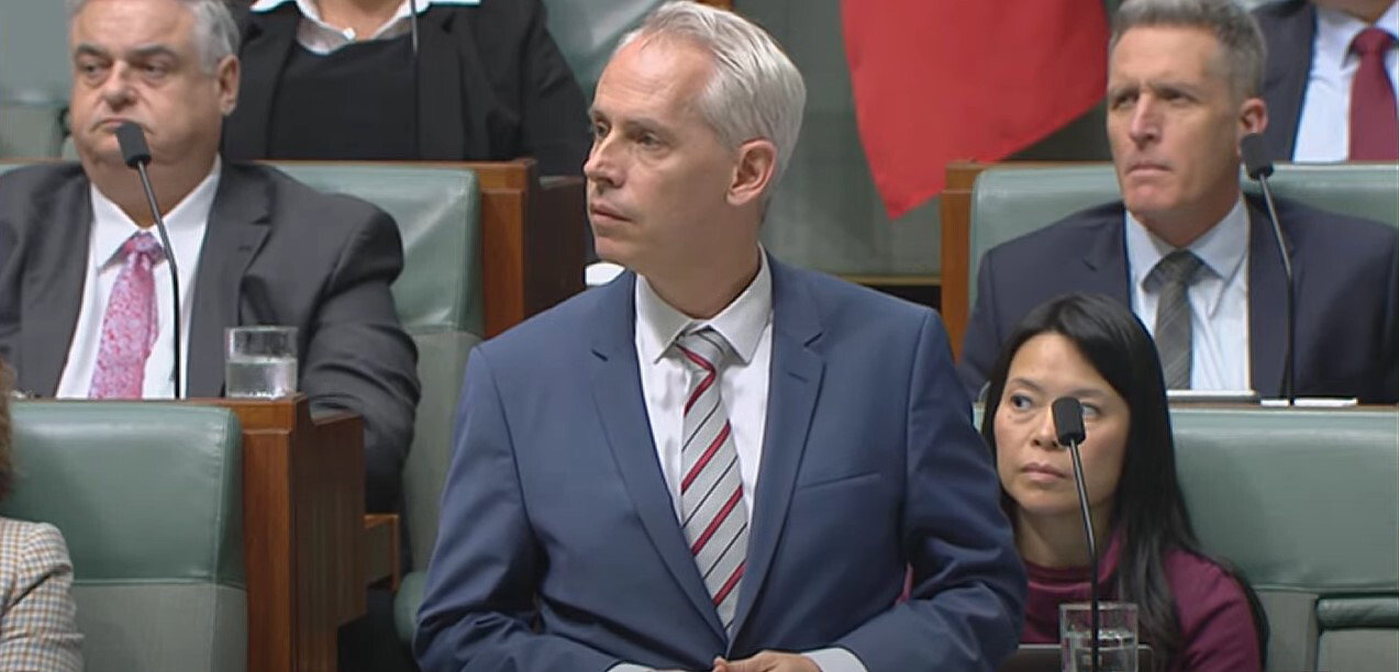 Andrew Giles is being grilled in question time