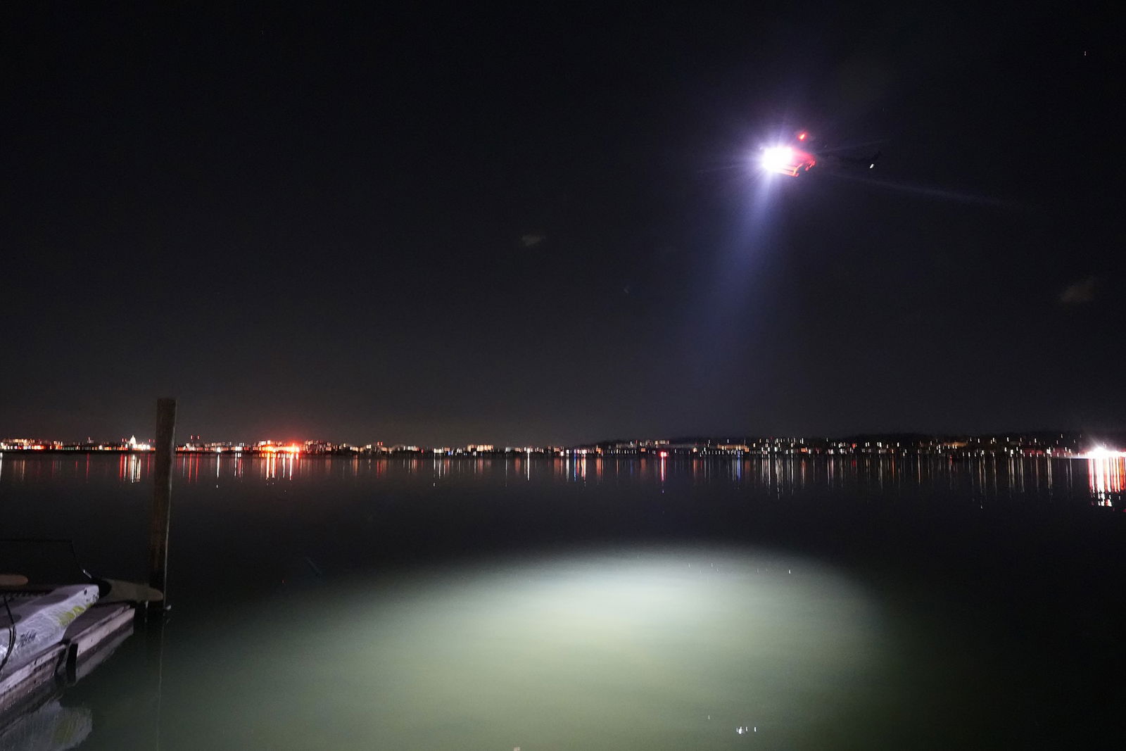 A helicopter has been shining a spotlight in the search area