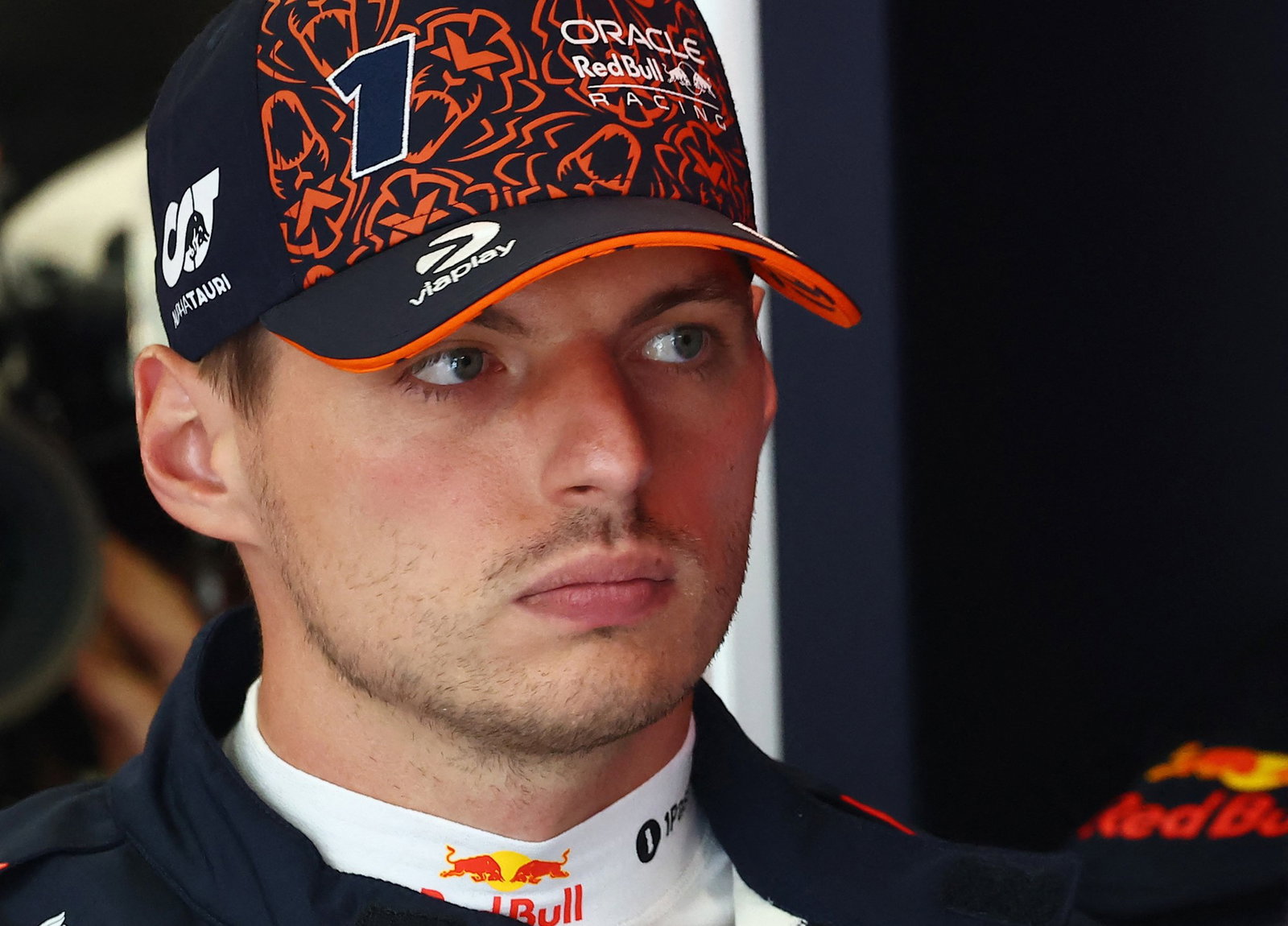 F1 dwell Belgian Grand Prix: Oscar Piastri begins second behind Lando Norris, moist race forecast for Spa-Francorchamps 7 Max Verstappen in the pits, wearing a cap and listening to a collegue