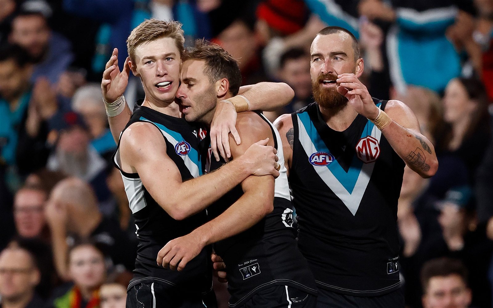 Port Adelaide players celebrate