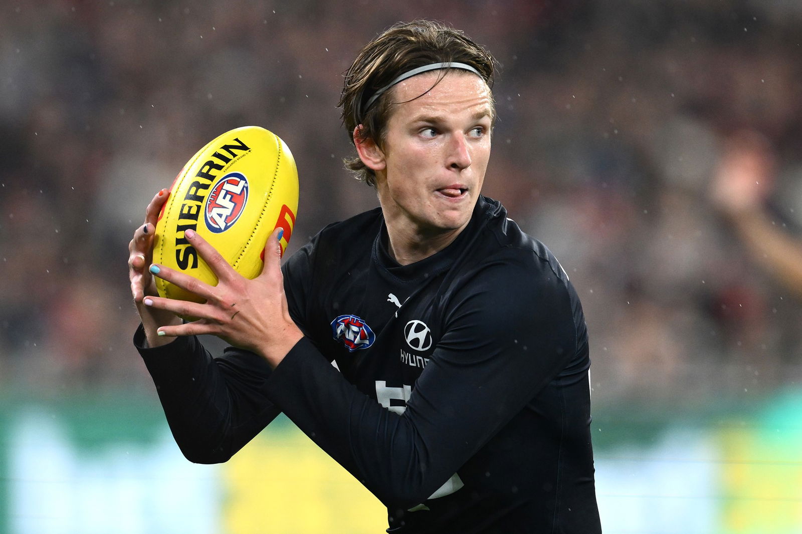 Jordan Boyd holds the ball for blues.