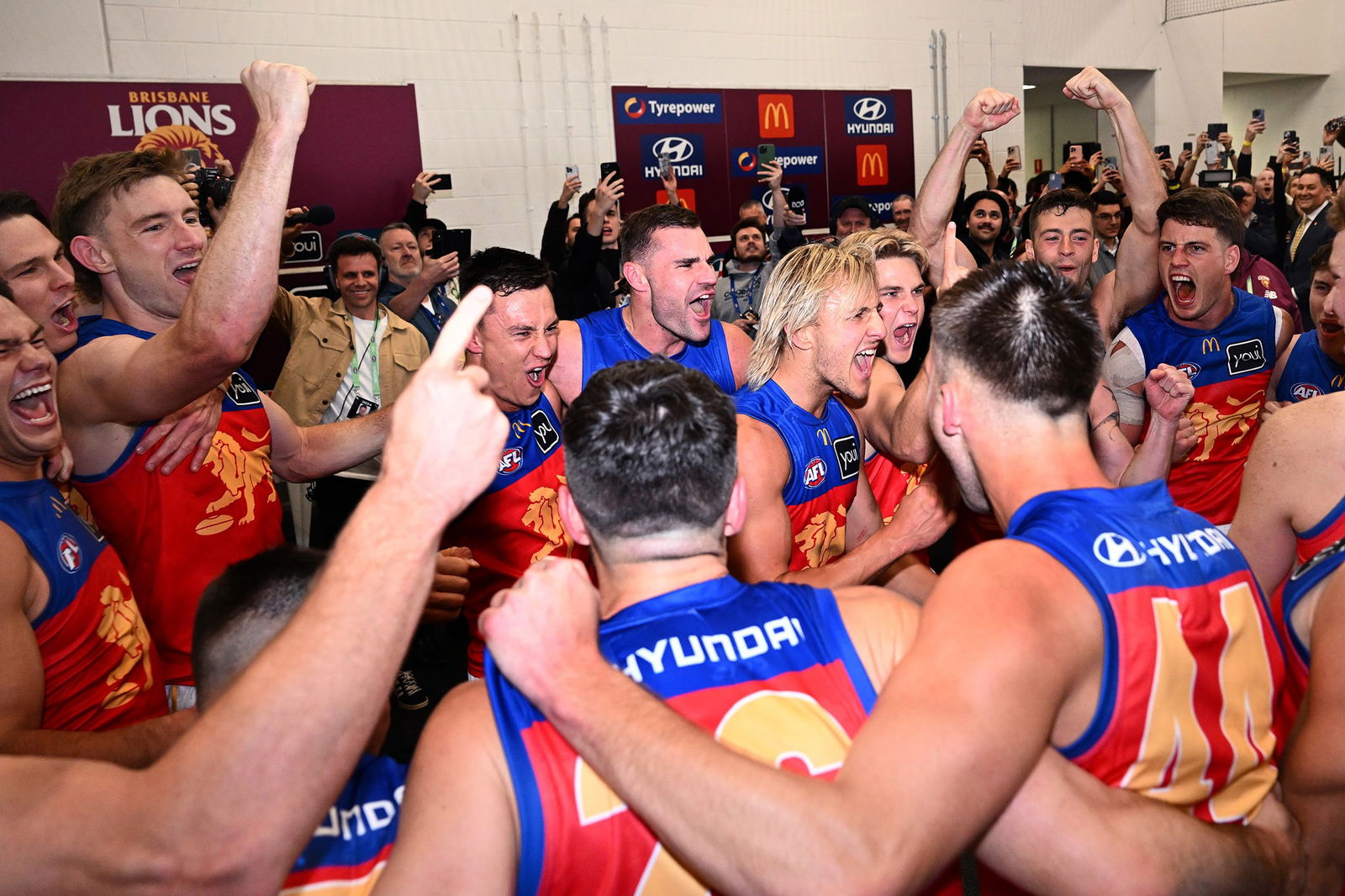 Lions celebrate in the rooms