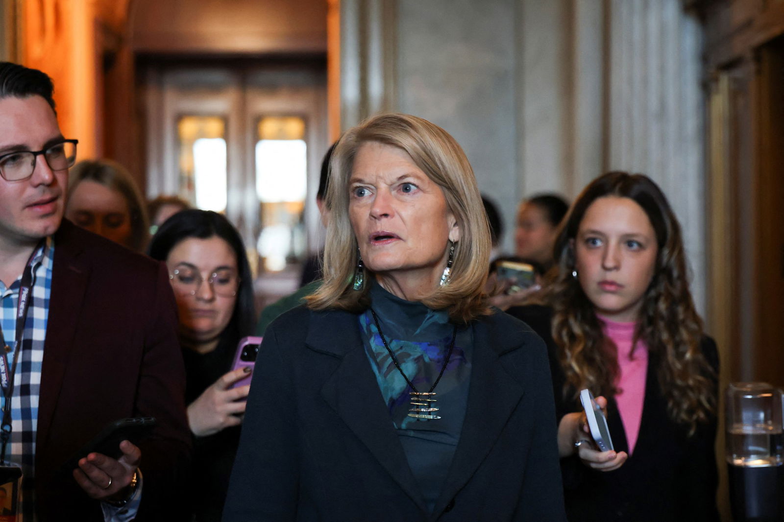 Lisa Murkowski leaving a crowd.