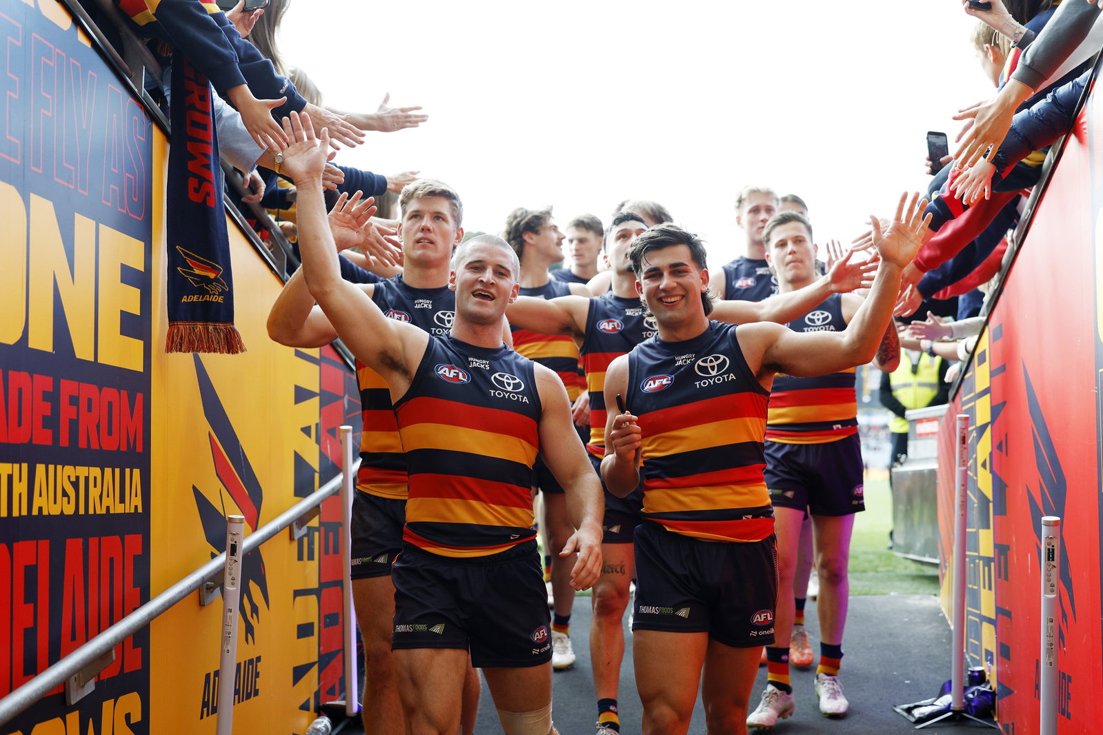 Sam Berry and Josh Rachele of the Crows after their win during the 2026 AFL Round 15 match between the Adelaide Crows and the Melbourne Demons at Adelaide Oval on June 20, 2026 in Adelaide, Australia.