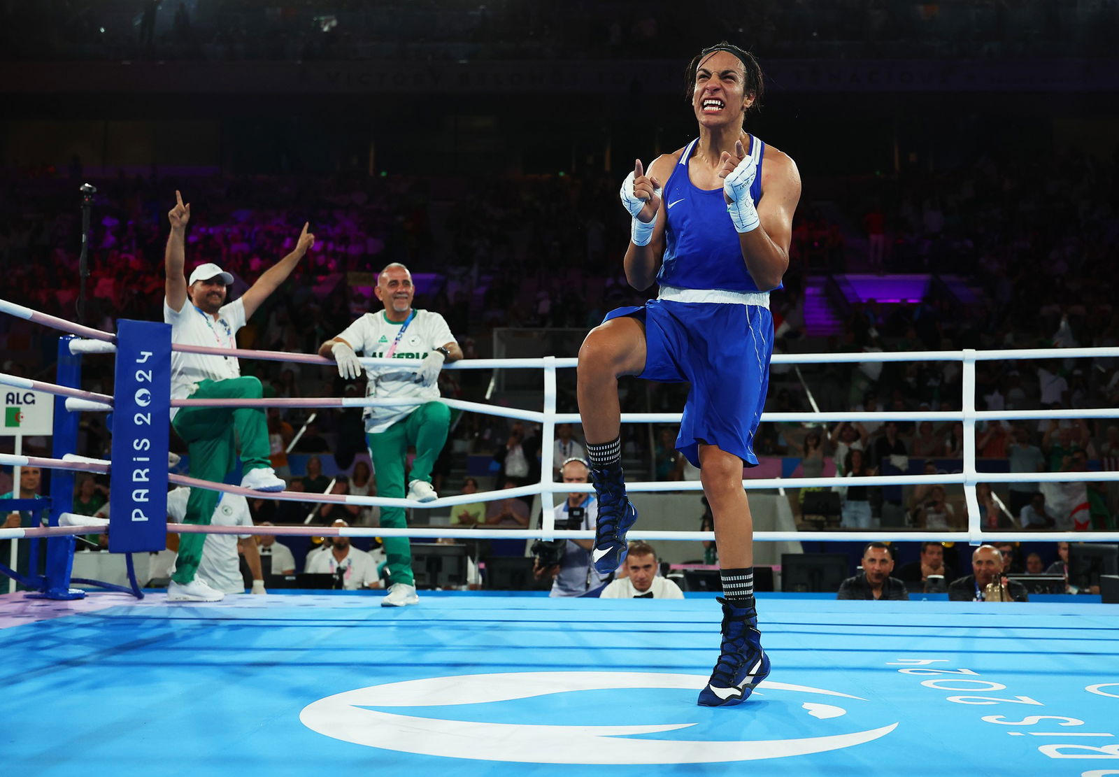 Algerian boxer Imane Khelif celebrates victory in her women's 66kg semifinal in Paris.