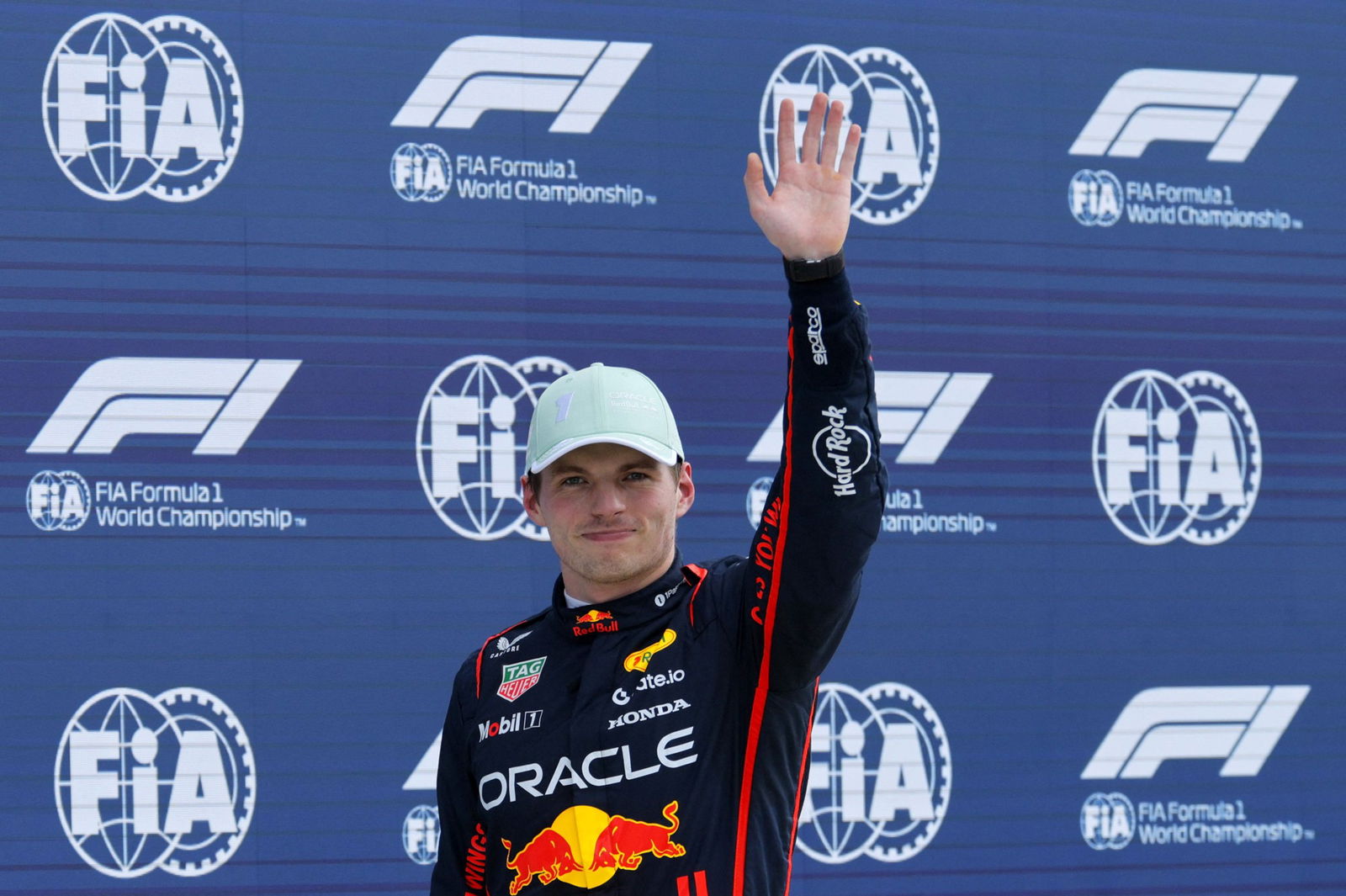 Red Bull's Max Verstappen celebrates after finishing first during qualifying.