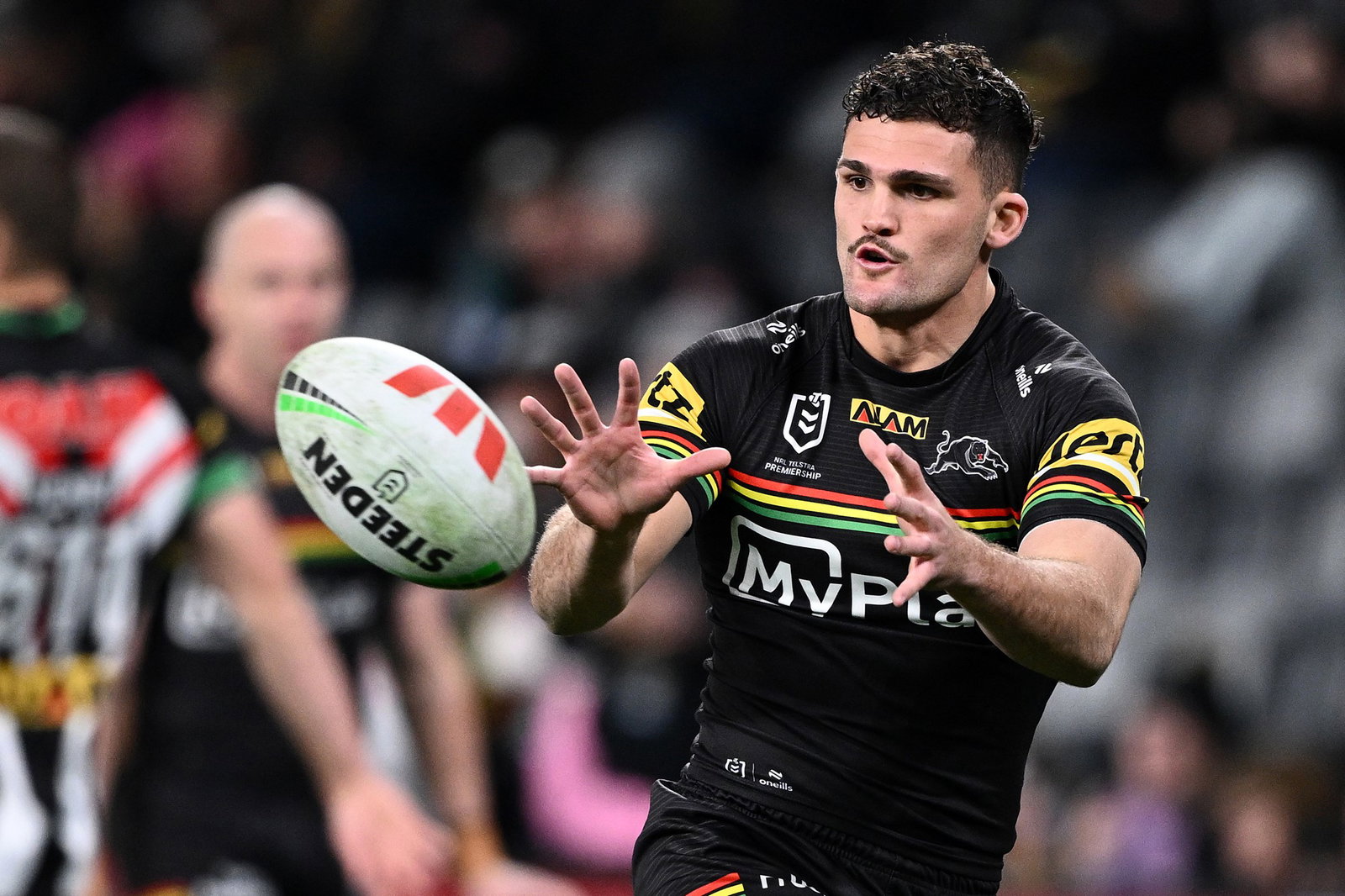 Nathan Cleary catching a football