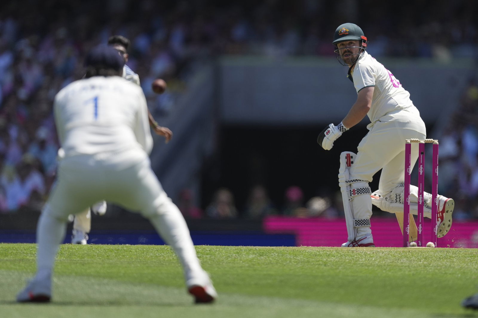 Australia's Travis Head watches as he is caught by India's KL Rahul