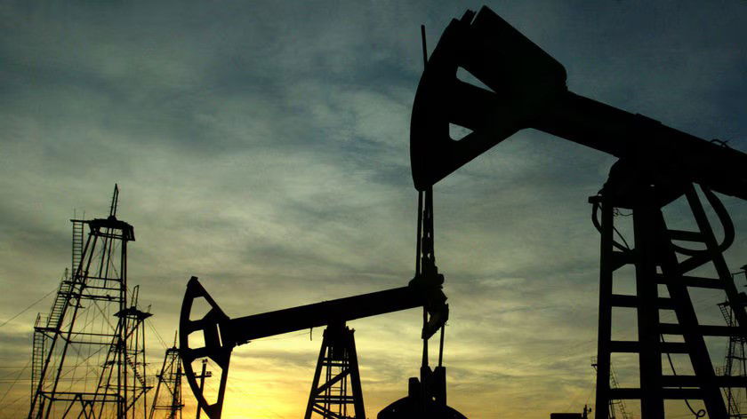 oil being mined at dusk