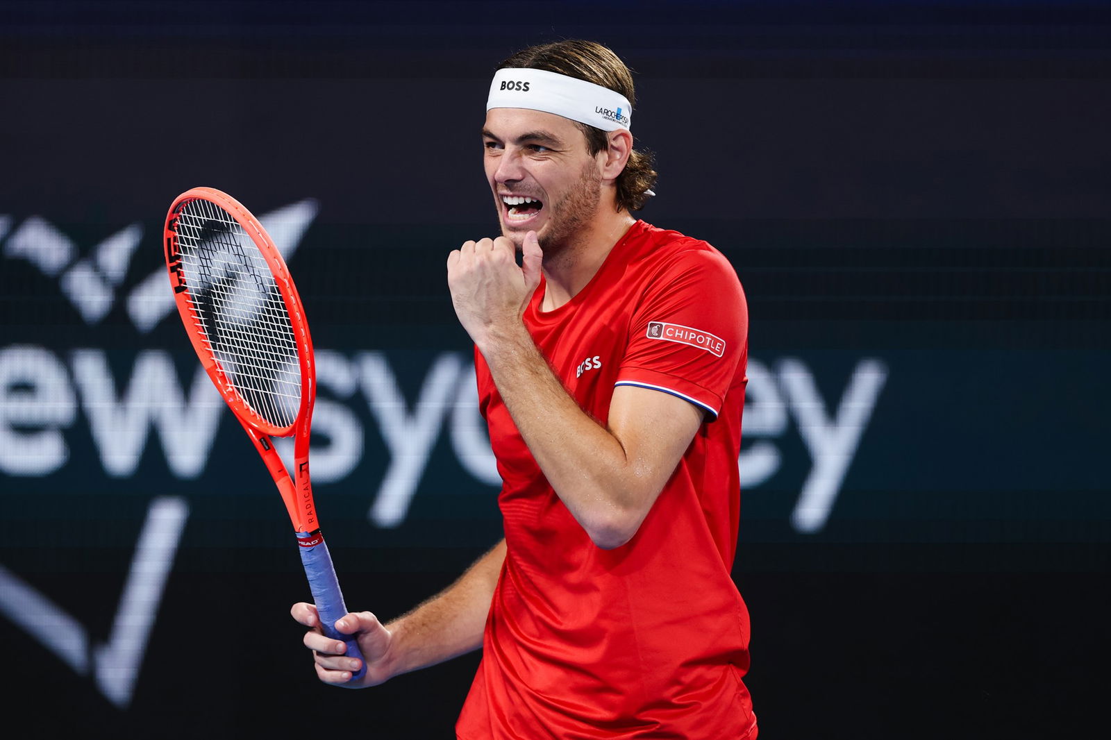 Taylor Fritz pumps his fist.