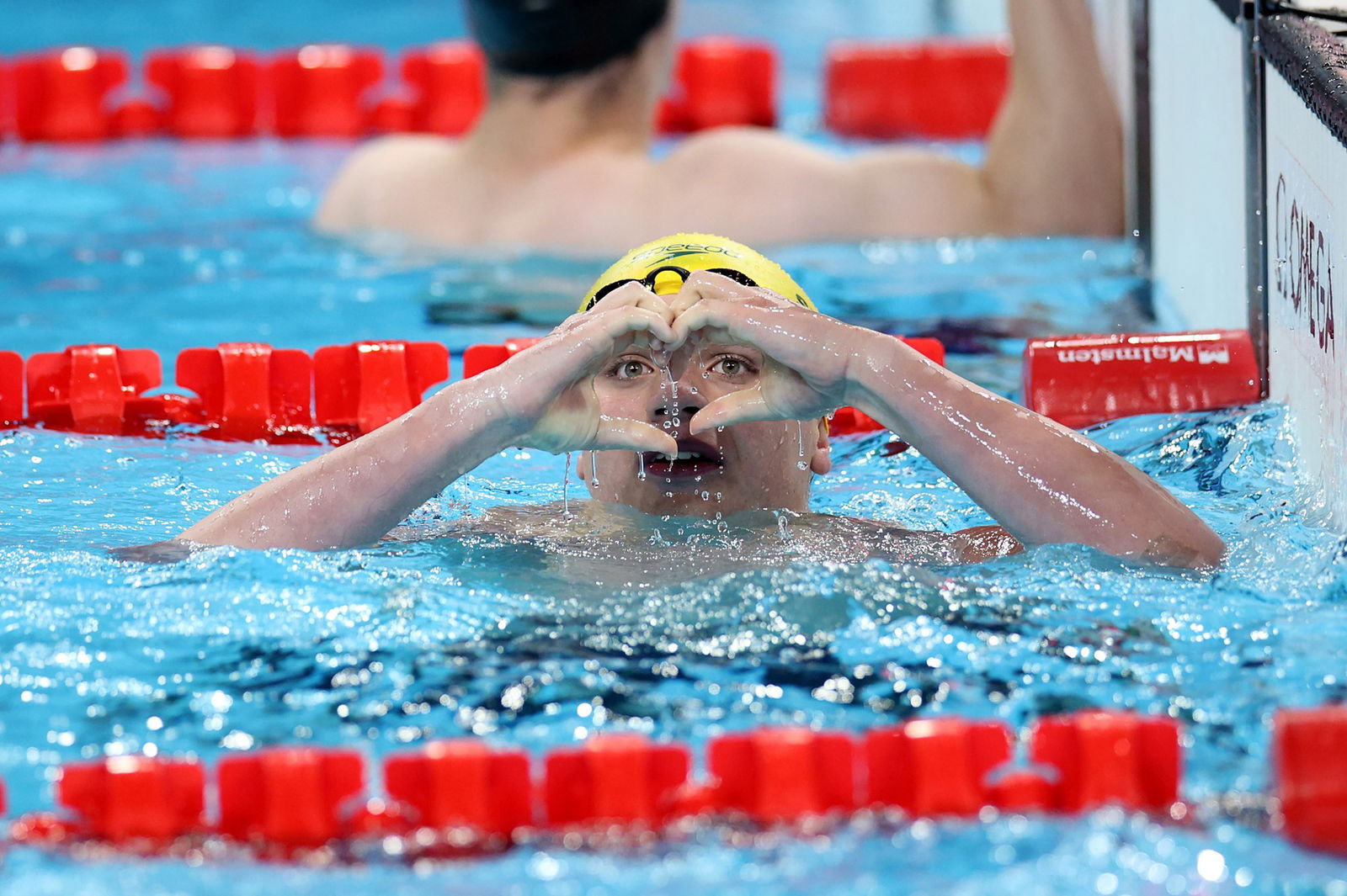 Callum Simpson of Team Australia celebrates winning gold during the Para Swimming Men's 100m Freestyle S8 Final in Paris.