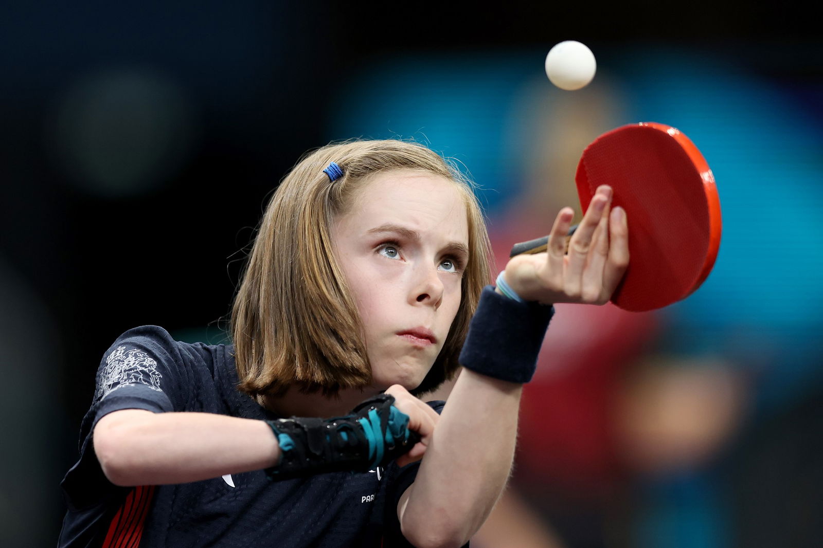 Great Britain's Bly Twomey serves in a women's doubles WD14 table tennis semifinal. 