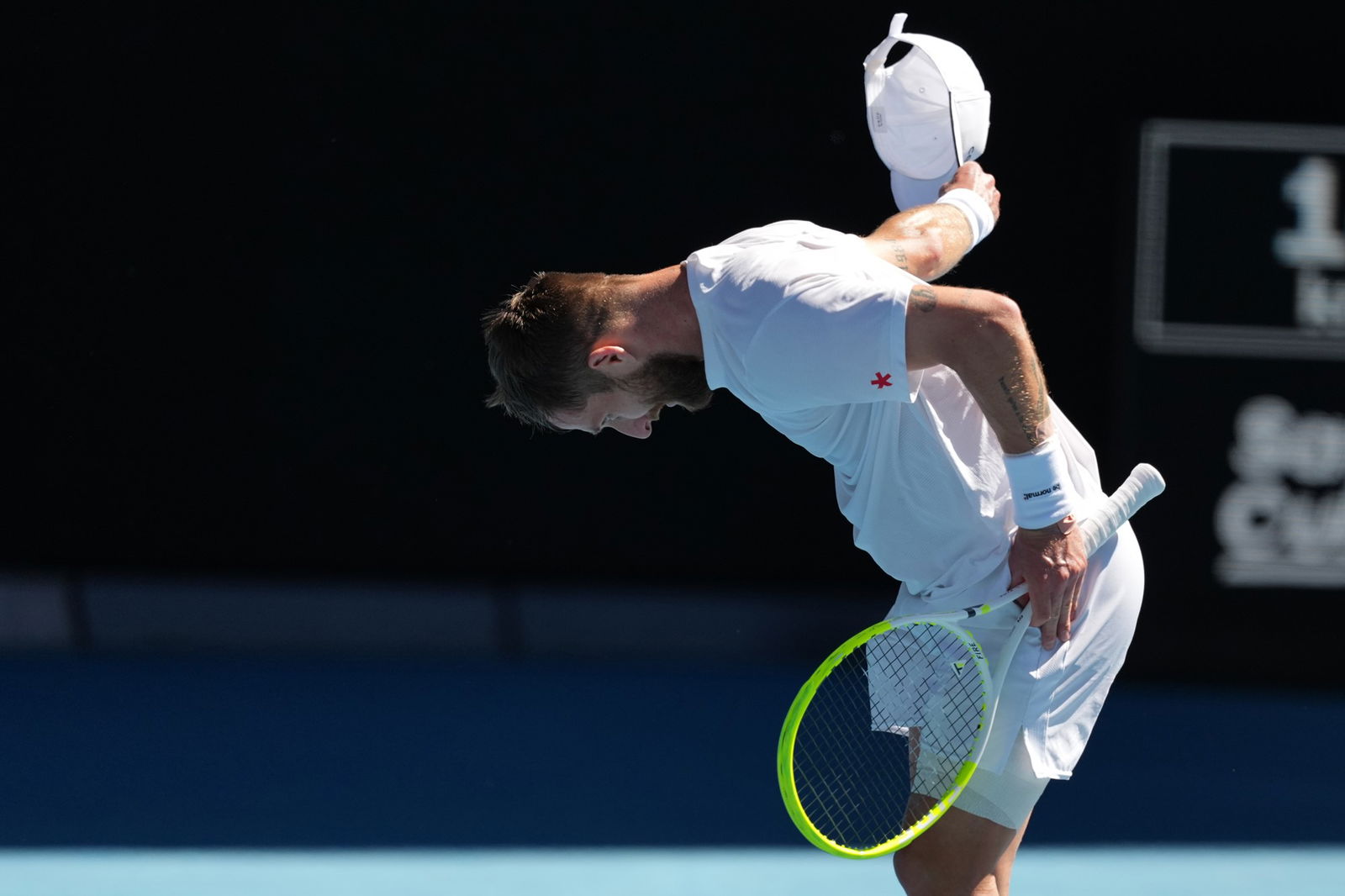 Corentin Moutet of France bows during his third round match against Carlos Alcaraz of Spain at the Australian Open tennis championship in Melbourne, Australia, Friday, Jan. 23, 2026.