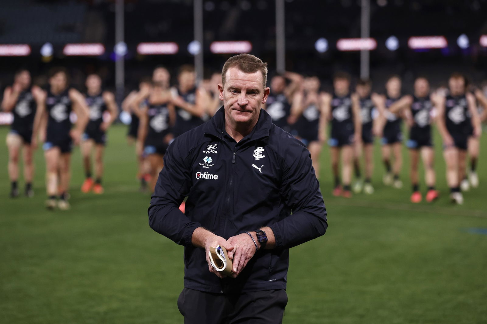 Michael Voss walks off the ground after Carlton's loss to Port Adelaide