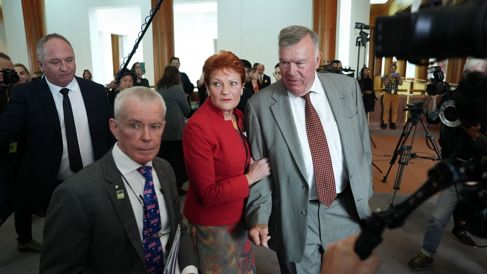 Roberts, Hanson and Farley at a press confernece.