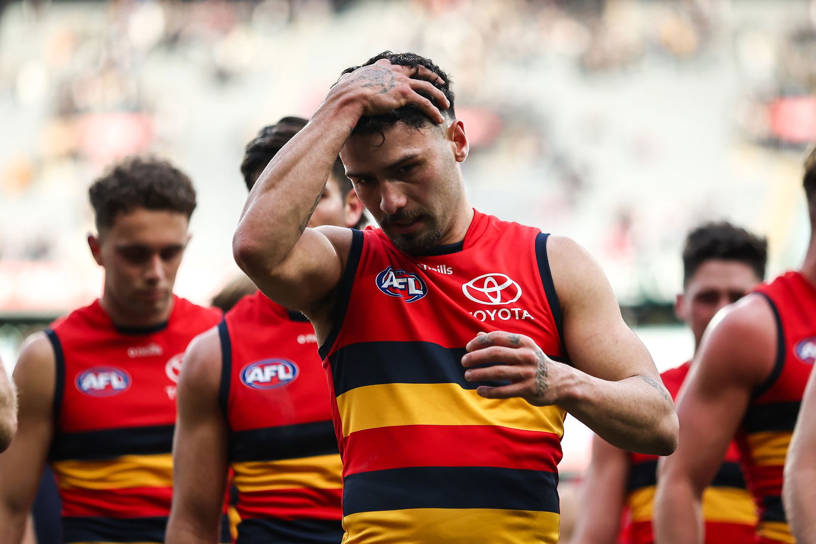 Izak Rankine of the Crows looks dejected after a loss during the 2023 AFL Round 15 match between the Collingwood Magpies and the Adelaide Crows at the Melbourne Cricket Ground on June 25, 2023 in Melbourne, Australia.