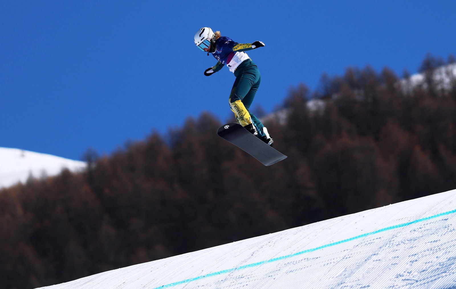 Abbey Wilson competes at Winter Olympics.