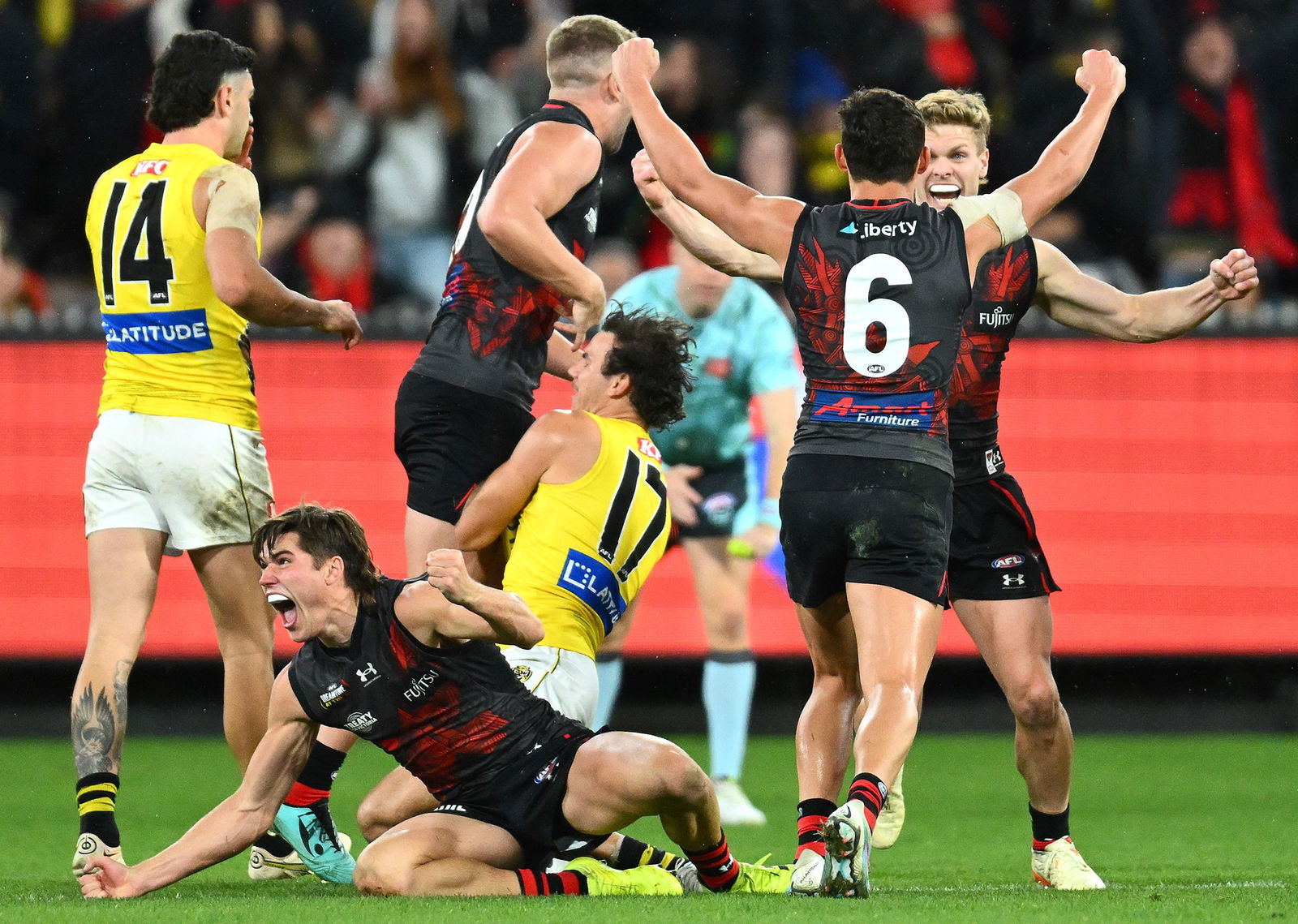 The Bombers celebrate winning the round 10 AFL match between Essendon Bombers and Richmond Tigers at Melbourne Cricket Ground, on May 20, 2023, in Melbourne, Australia.