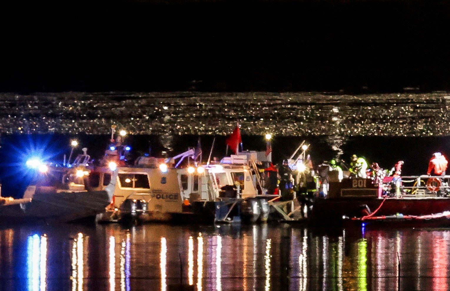 Search and rescue workers on the Potomac River