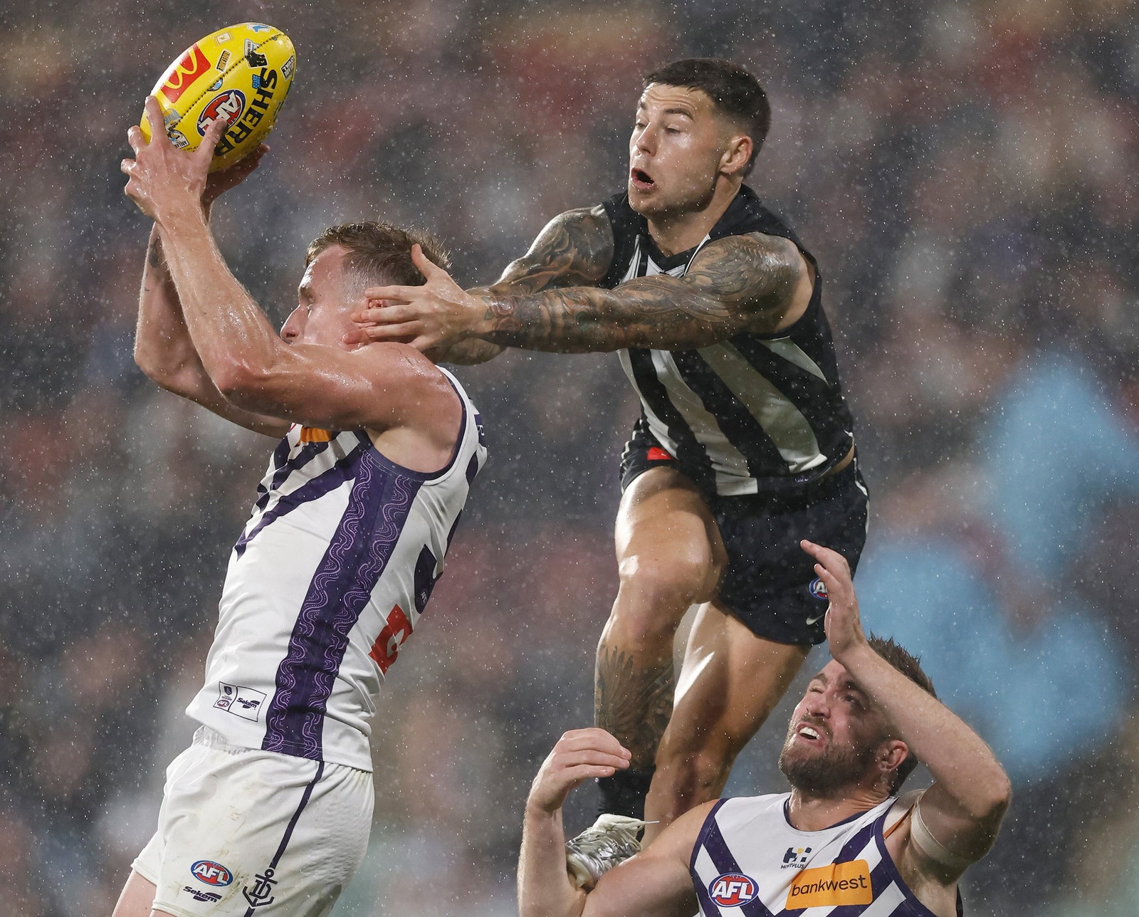 Josh Treacy takes a mark against the Magpies.