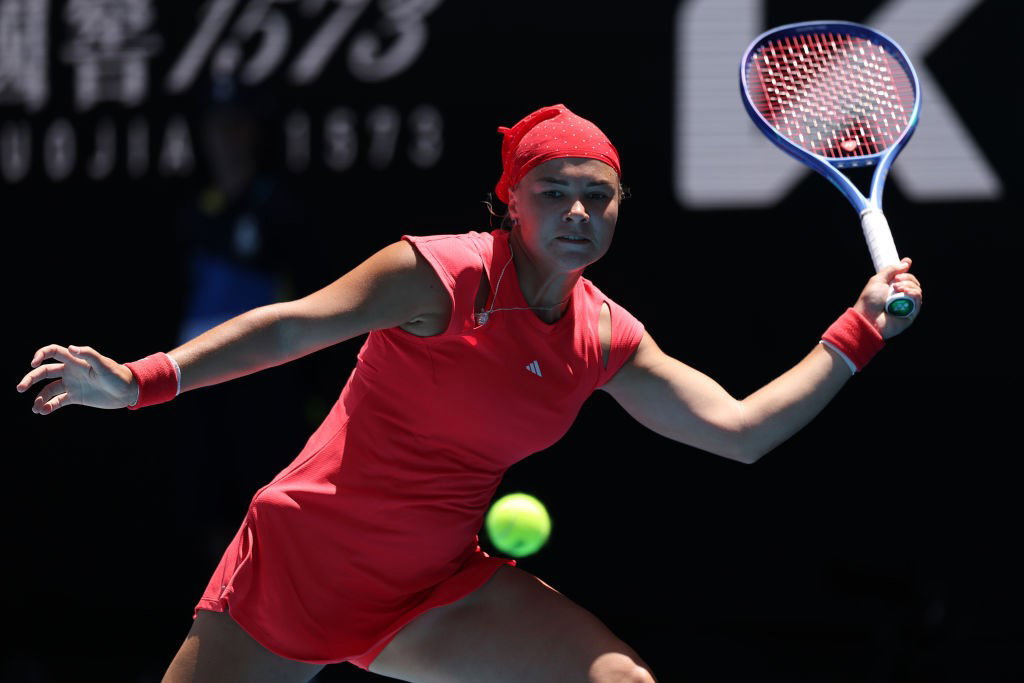 Diana Shnaider hits a forehand at the Australian Open.