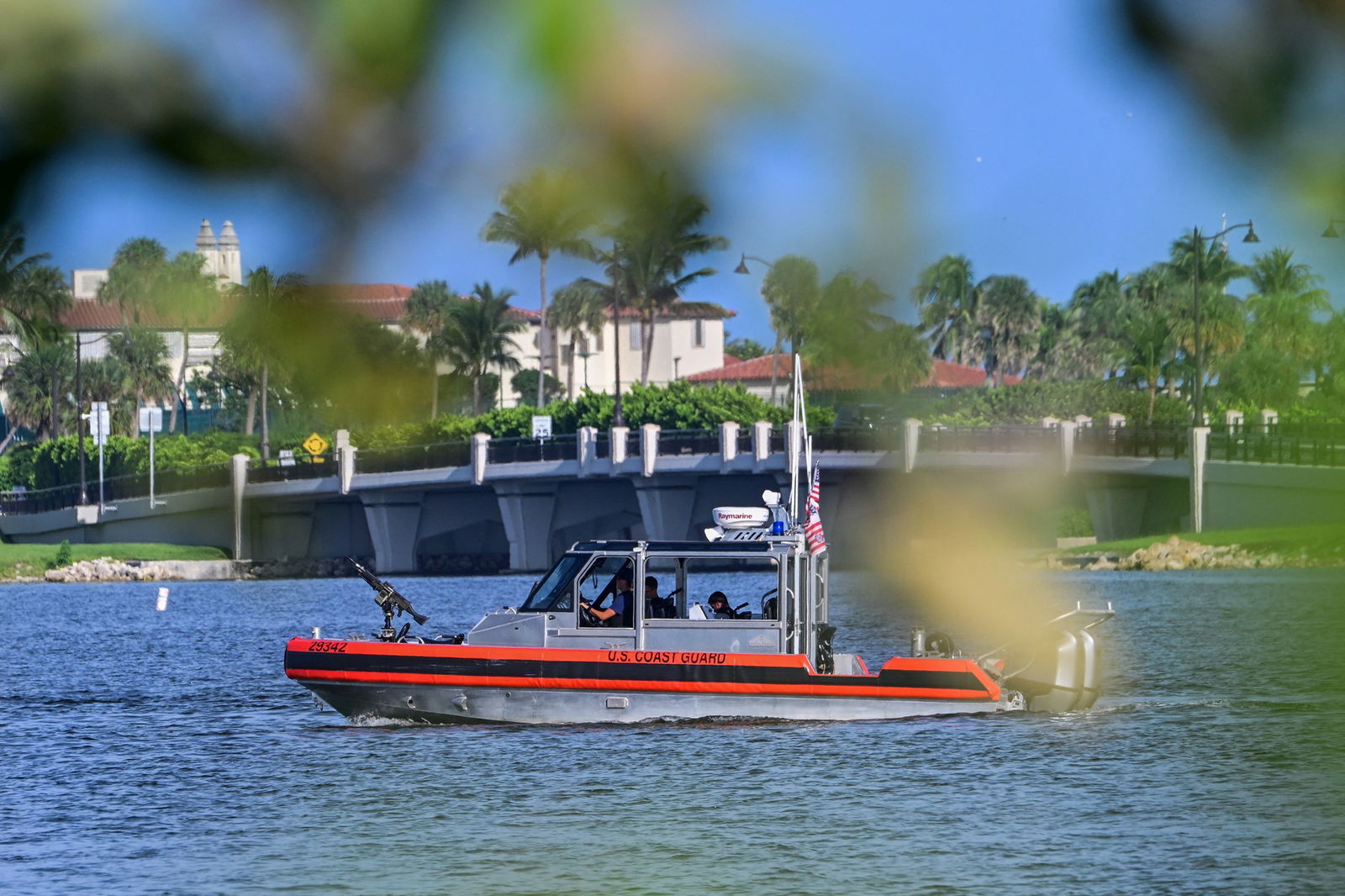 A red police baot patrols the water 