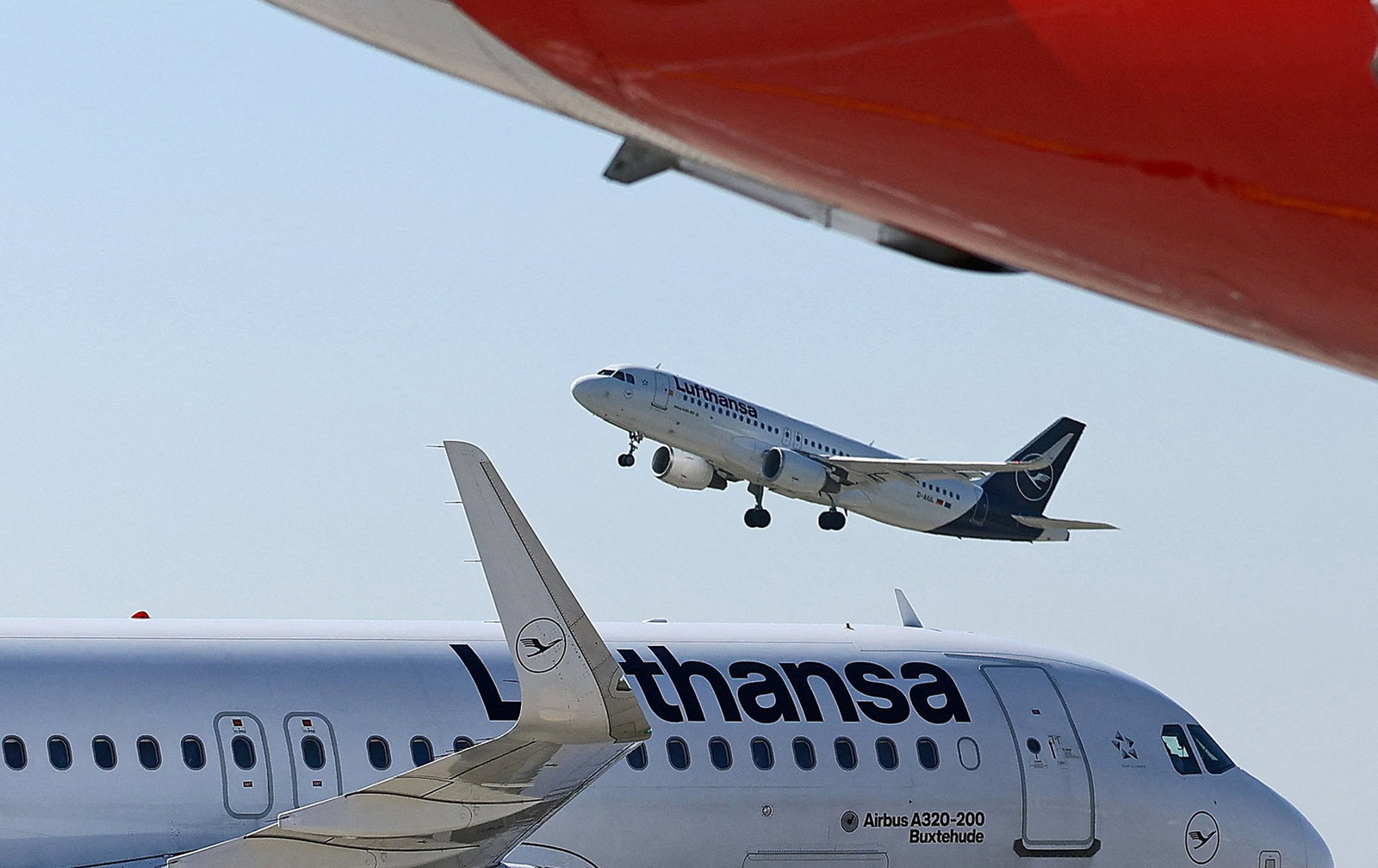 A plane takes off on a runway.