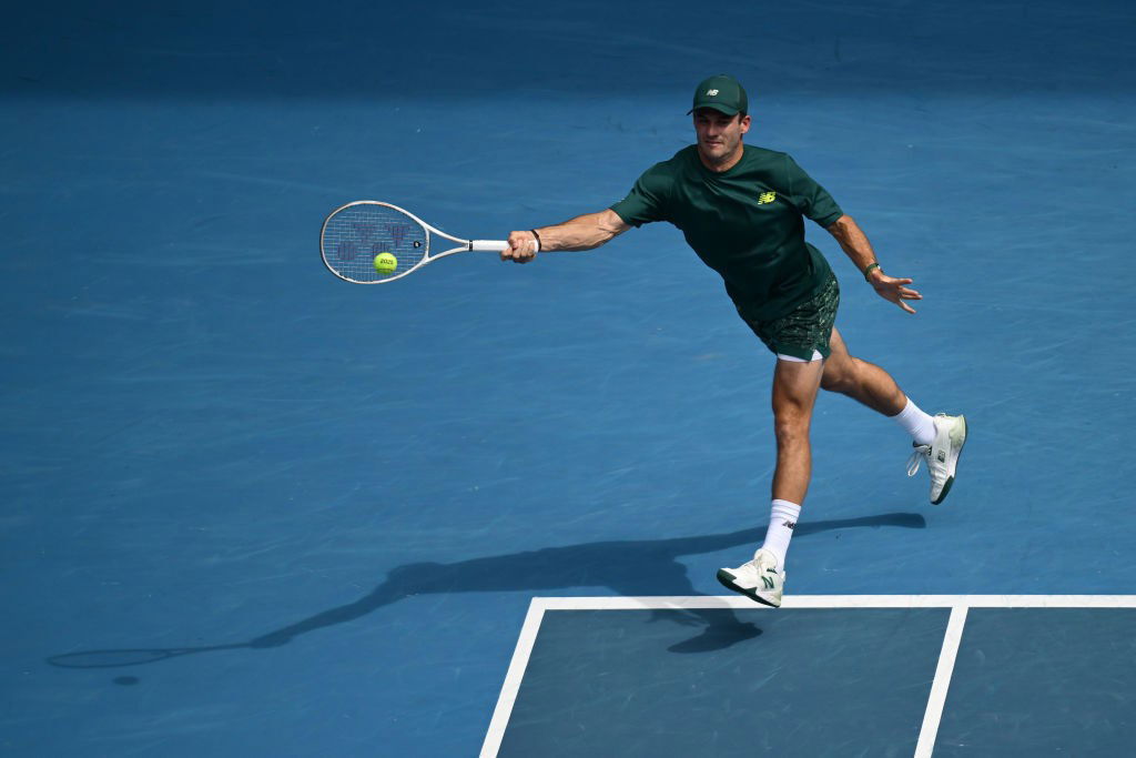 Tommy Paul hits a forehand at the Australian Open