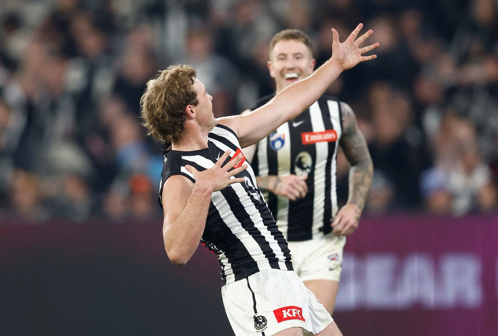 Angus Anderson of the Magpies celebrates a goal during the 2026 AFL Round 19 match between the Collingwood Magpies and the Carlton Blues at the Melbourne Cricket Ground on July 18, 2026 in Melbourne, Australia. 
