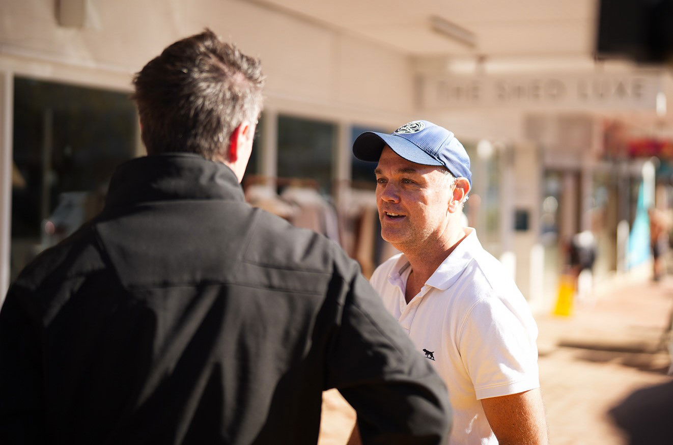 NSW Premier Chris Minns speaks to a local
