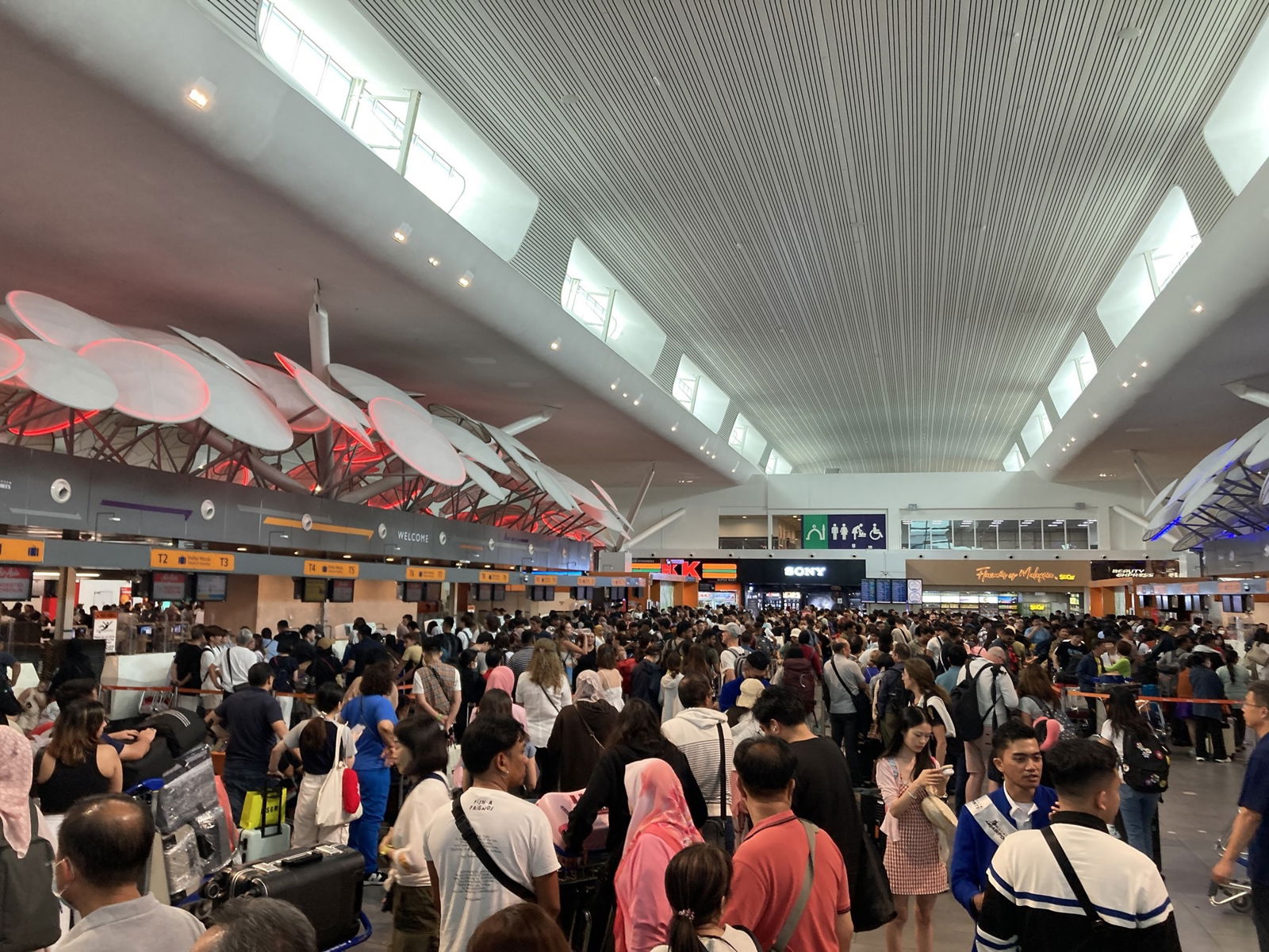 Crowded terminal at Kuala Lumpur International Airport