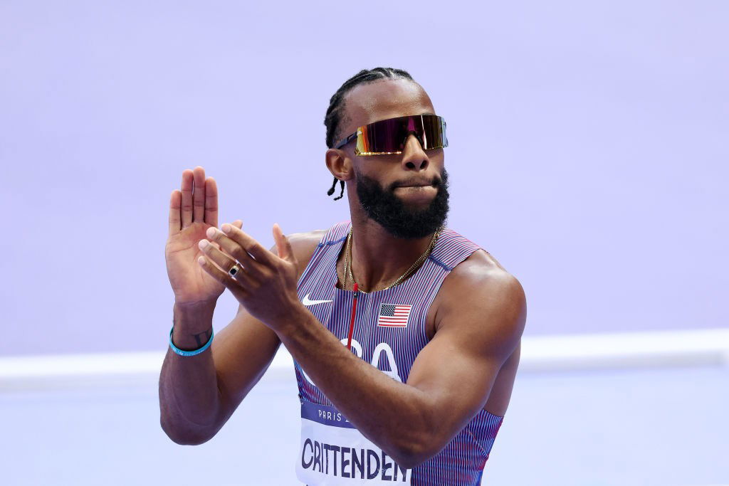 Freddie Crittenden applauds after winning his 110m hurdles repechage race at the Paris Olympics.