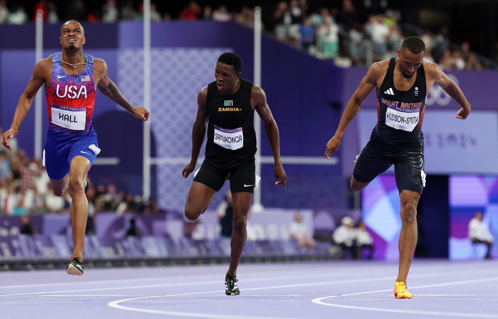 American Quincy Hall (left) wins the men's 400m final from Matthew Hudson-Smith (right) and Muzala Samukonga (centre).