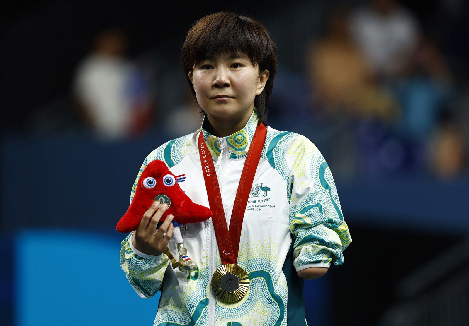 Qian Yang with her gold medal.