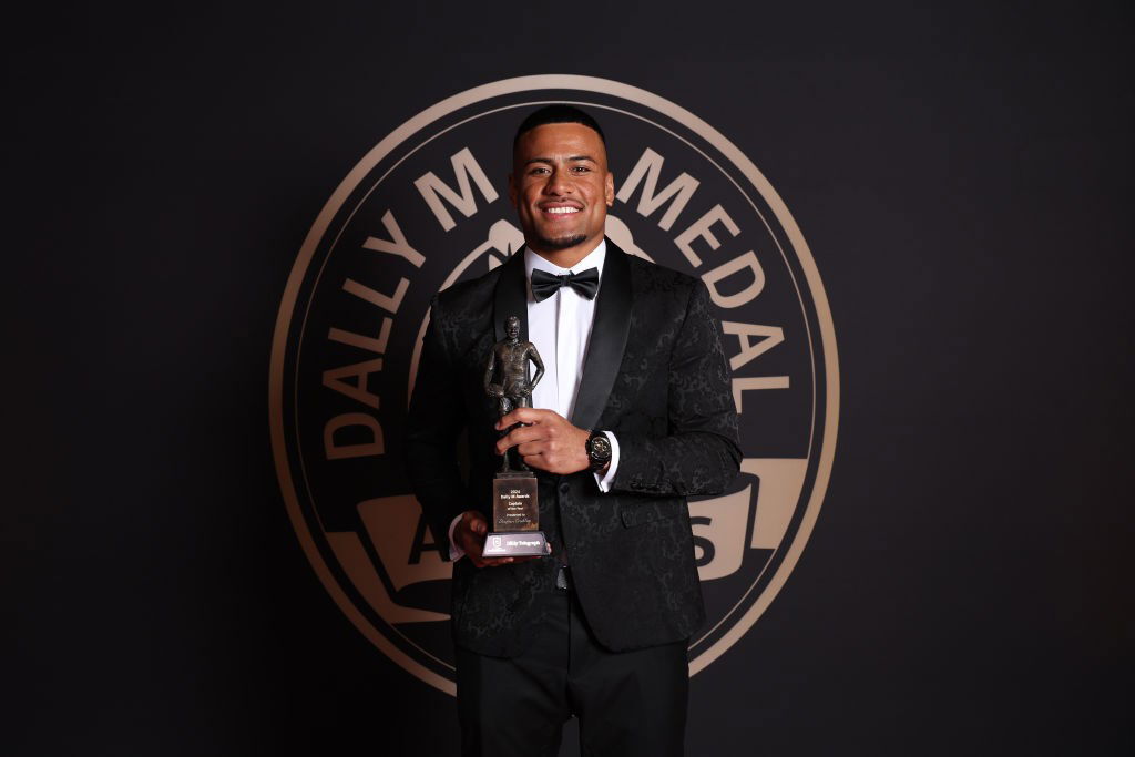 Stephen Crichton holds his Dally M captain of the year award.