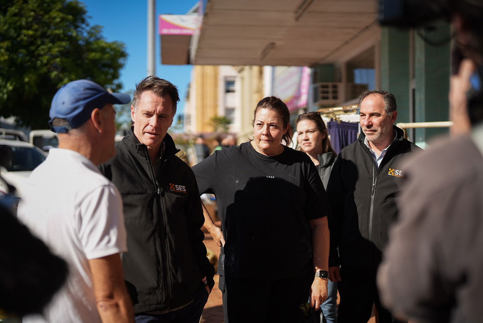 NSW Premier Chris Minns speaks to a group of locals