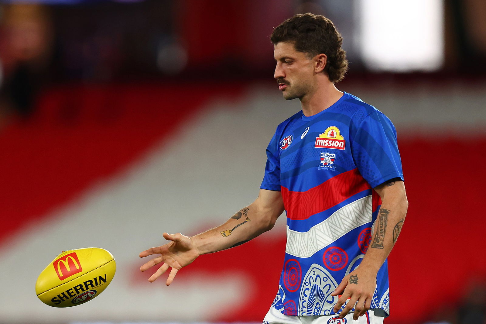 Tom Liberatore heats up with a ball.