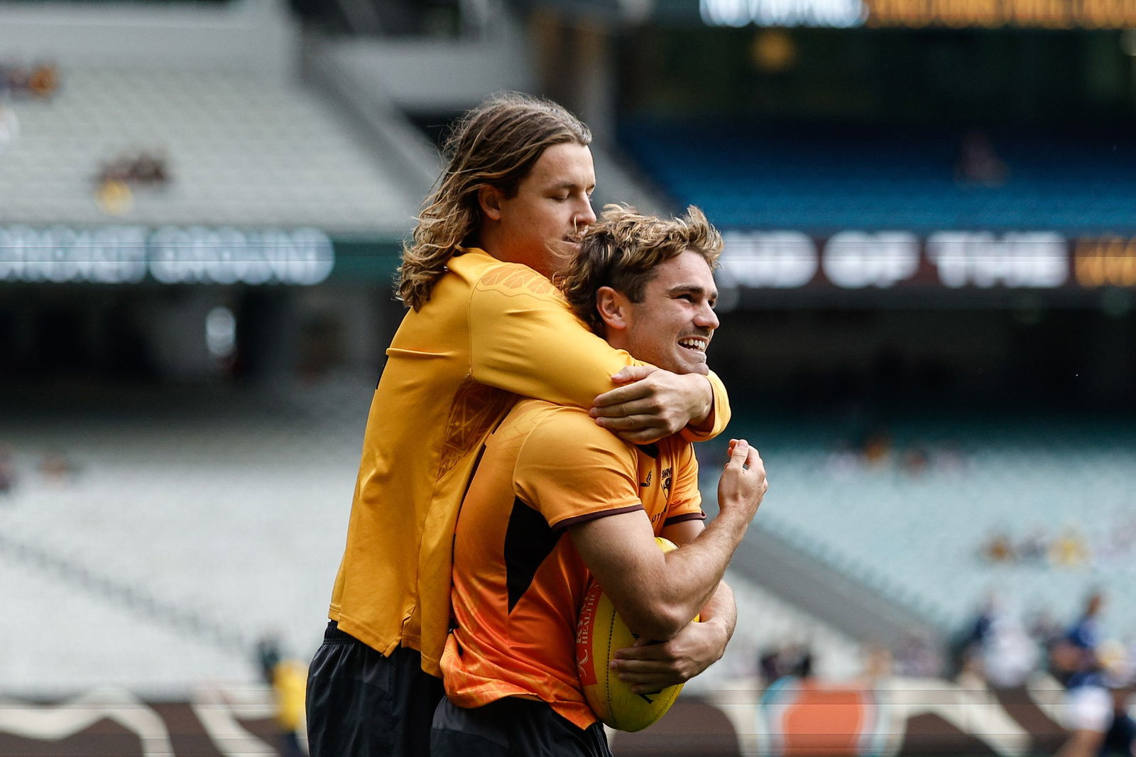 Jack Ginnivan and Nick Watson are set to run another football clinic.