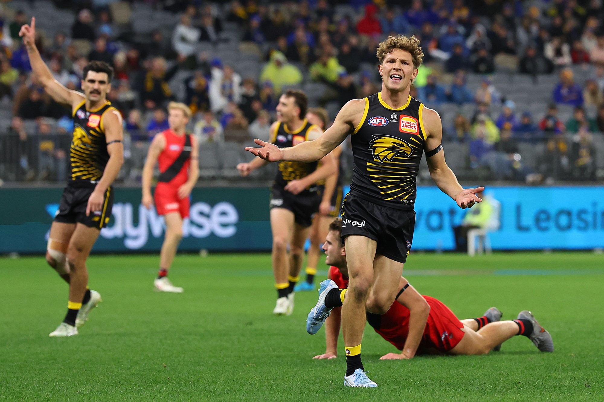 Milan Murdock (right) was outstanding up forward as West Coast secured a 30-point win over Essendon at Perth Stadium.