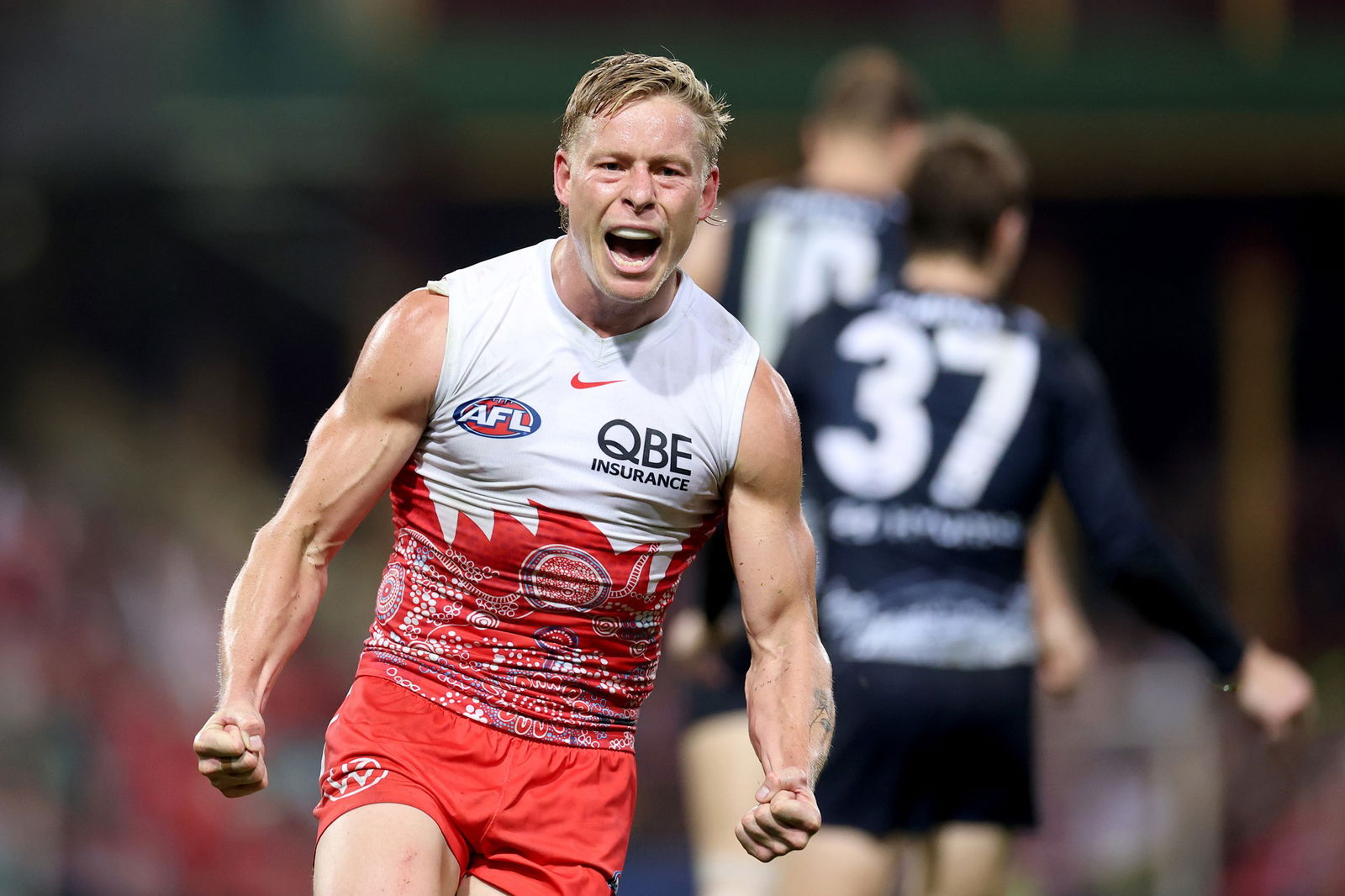 Isaac Heeney celebrates a goal