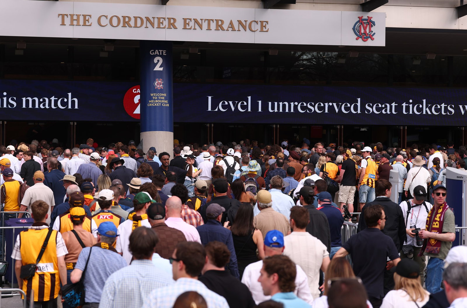 Fans line up to enter the MCG ahead of the Hawthorn-Brisbane clash.