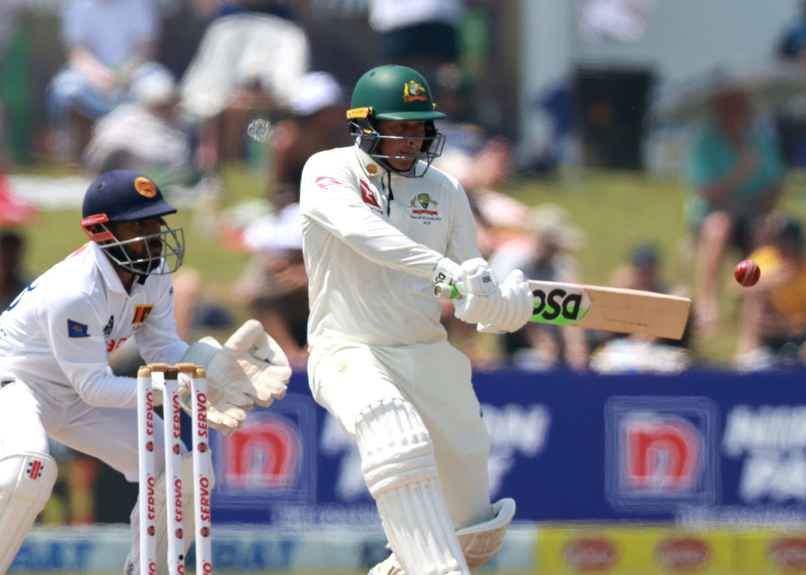 Usman Khawaja moves his bat away from the ball during a Test against Sri Lanka.